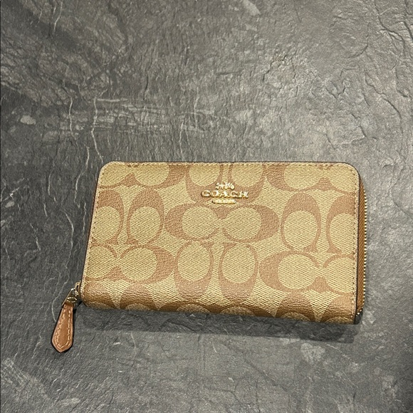 Coach Handbags - Coach Medium ID Zip Wallet in Signature Canvas brown